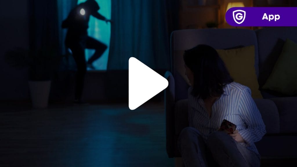 Woman hitting panic button on her Guardian Protection app after a break in