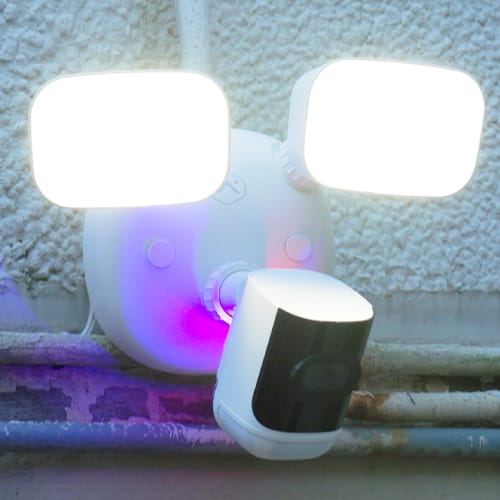 Guardian Protection floodlight camera mounted on a home's exterior