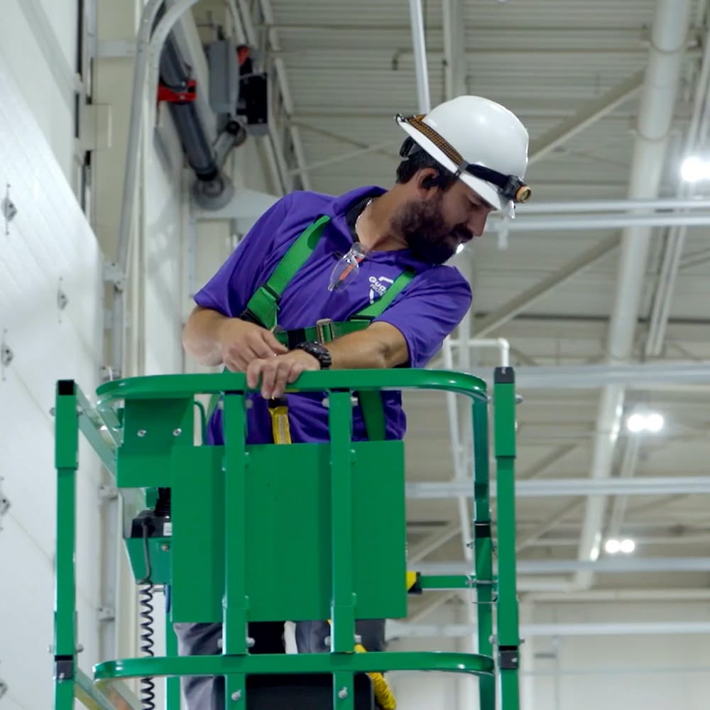 A Guardian Protection tech installing a system