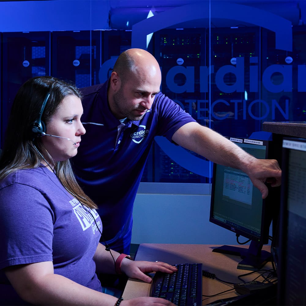 Two Security Experts in the Guardian Protection Monitoring Center