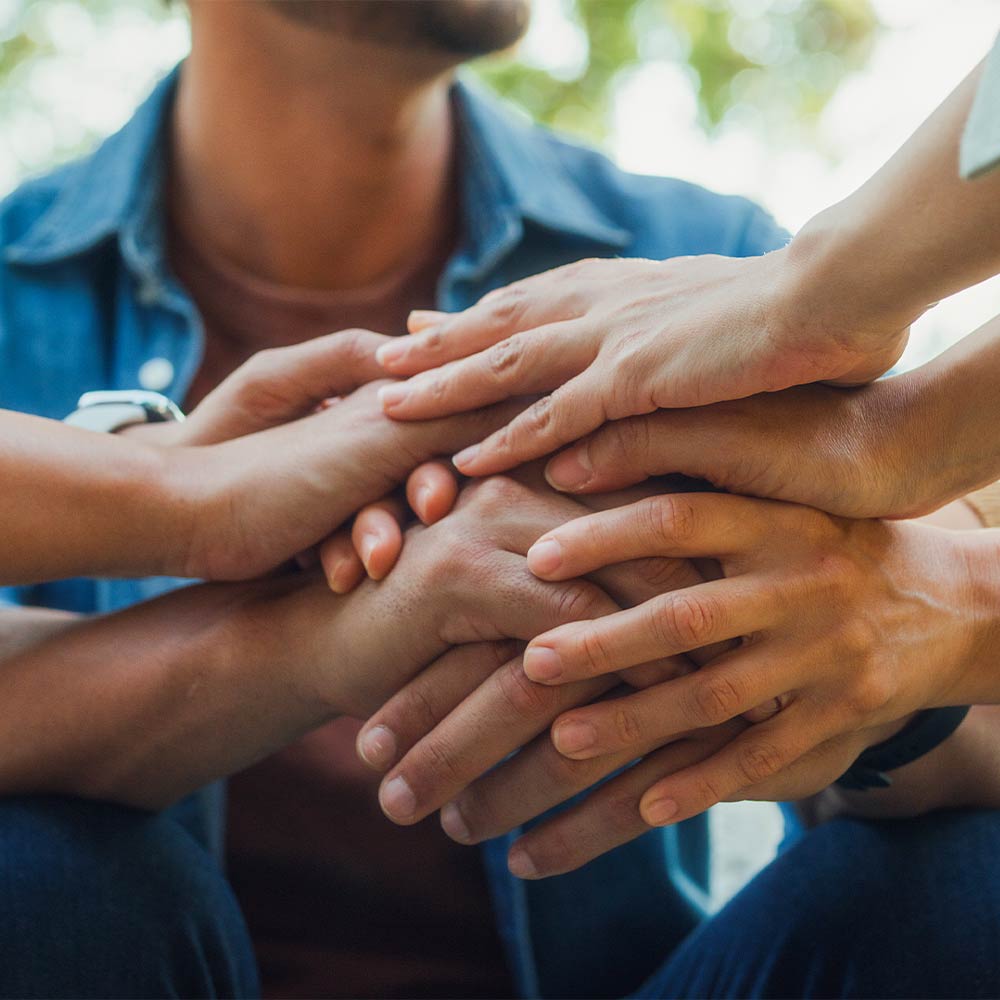 Hands holding each other