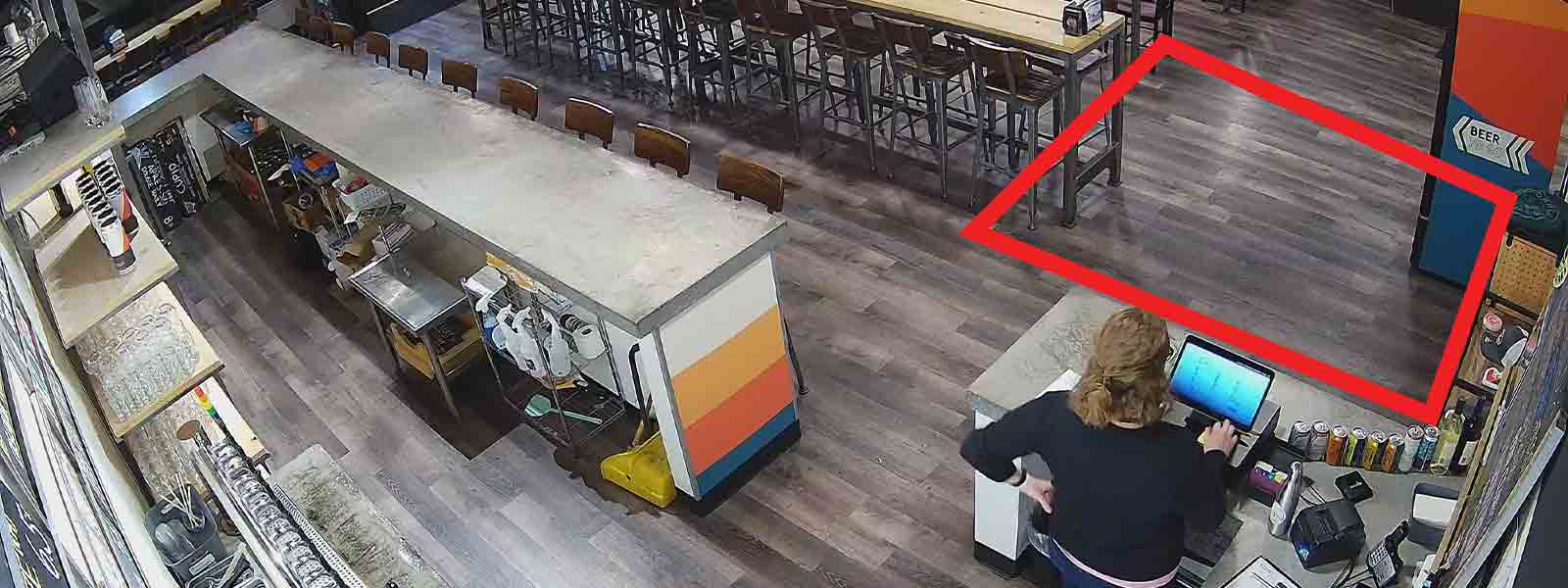 View from Guardian Protection video analytics showing employee at restaurant register with no line